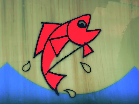 A red cartoon fish leaps above blue painted water on a pale exterior panel.